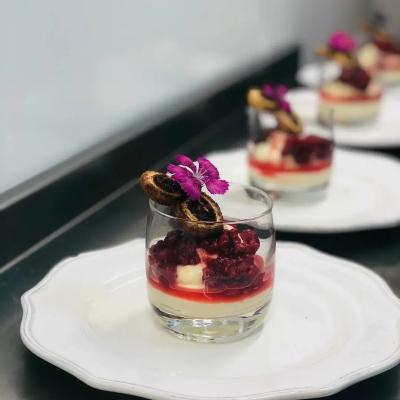 white chocolate mousse with berry compote and cinnamon palmier
