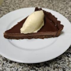 Chocolate tart with vanilla ice cream