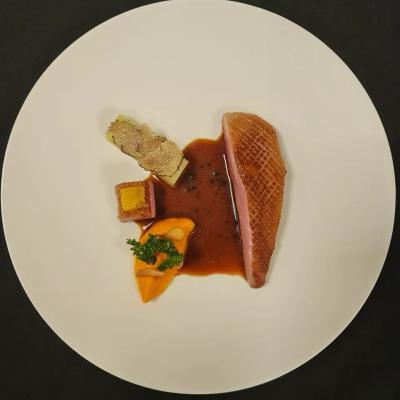 Pan Seared Duck with Sweet Potato Canelé & Roasted Leeks with Jus