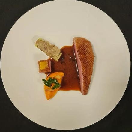 Pan Seared Duck with Sweet Potato Canelé & Roasted Leeks with Jus