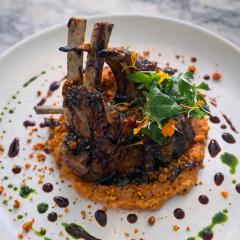 Charcoal-Grilled Lamb Chops with Sweet Potato Purée, Herb Oil & Red Wine Jus