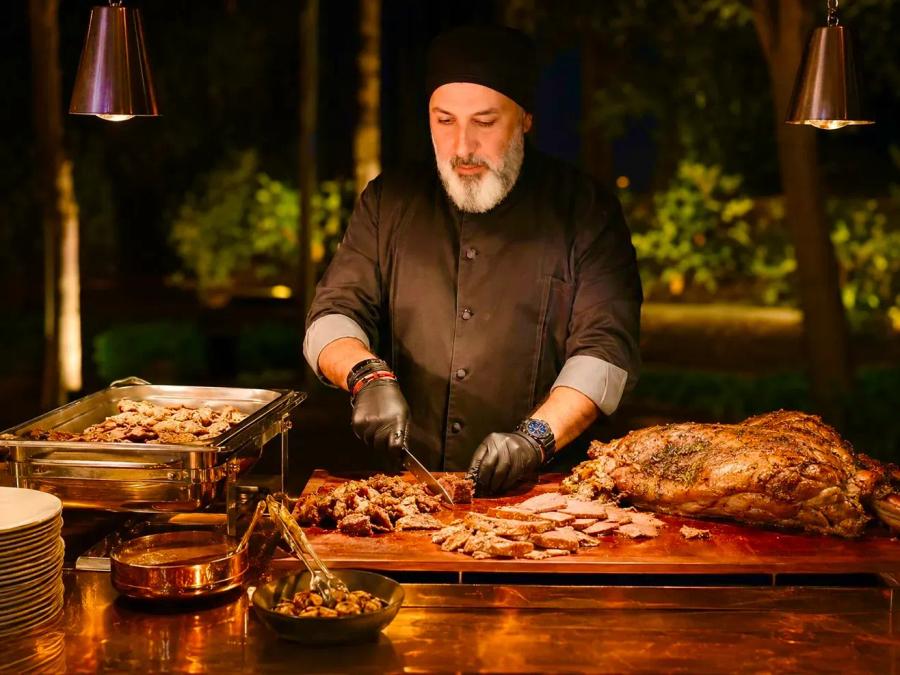 Live European BBQ station featuring freshly grilled meats,prepared and served live for guests